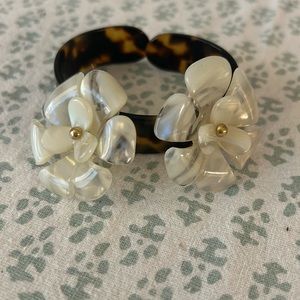 J. Crew Floral stud earrings and Madewell tortoise bracelet